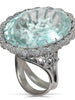 Luxury ring with a large light blue aquamarine and diamond accents on a white background