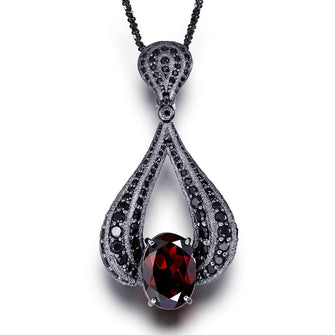 BLACKENED GOLD TWIST PENDANT WITH GARNET AND BLACK SPINEL